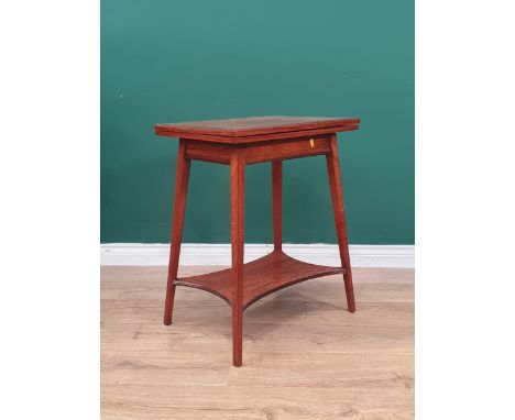 An Edwardian satinwood two-tier fold over Card Table with boxwood and ebonising stringing and fitted green baize, raised on s