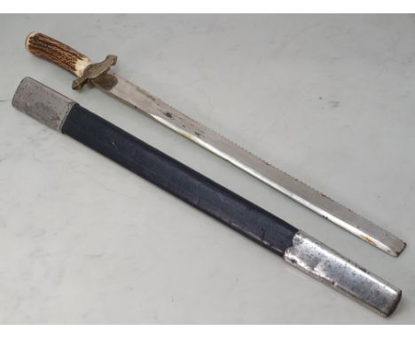 An antique Continental saw-backed Hunting Side Arm with antler grip with leather steel mounted scabbard 2ft 2in L overall