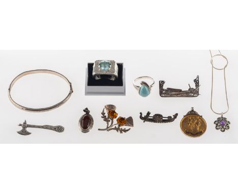 A mixed group of silver jewellery, to include a Scottish axe brooch, a gondola brooch set marcasite, other brooches, a flower