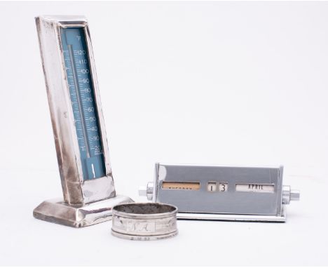 A Chester silver desk thermometer by E J Clewley & Co, Chester 1912, with modern thermometer, a chrome desk calendar and a na