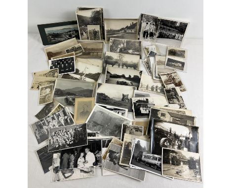 A collection of assorted vintage black &amp; white photographs showing vehicles and social history. To include cars, buses, p