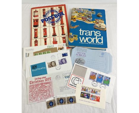 2 vintage world stamp stock books with a selection of assorted stamps together with a small quantity of first day covers. 