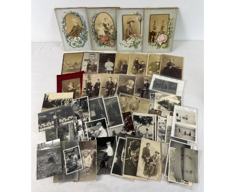 A collection of assorted vintage black &amp; white photographs and cabinet cards. 
