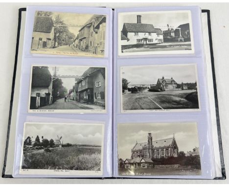 An album of 120 assorted Edwardian &amp; Vintage postcards, to include RP's. Album include ships, street scenes and coastal s