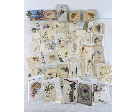A tub of 100 assorted Edwardian and vintage greetings cards, all in plastic or paper display wallets. 
