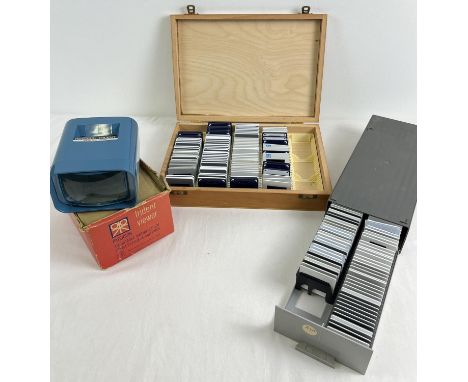 2 boxes of vintage 1960's photographic slides together with a boxed Trident slide viewer. 