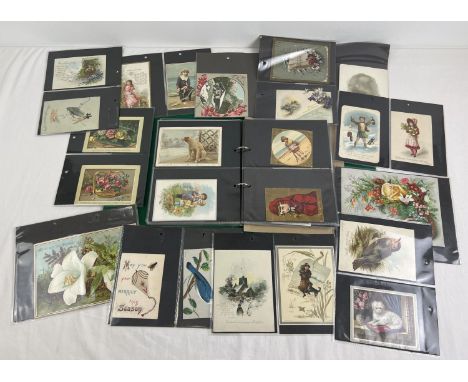 A green ring binder of approx. 150 assorted Victorian &amp; Edwardian greetings cards. All displayed in plastic sleeves. 