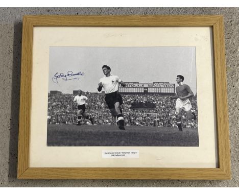 A framed and glazed signed reproduced black and white photograph of Tottenham Hotspur footballer Johnny Brooke. Complete with