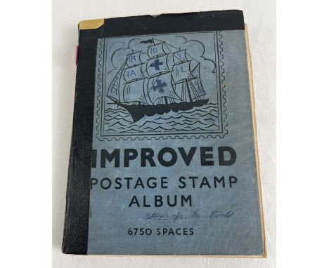 A vintage Stanley Gibbons Stamp album of assorted world stamps to include franked & unfranked examples. Stamps to include sov