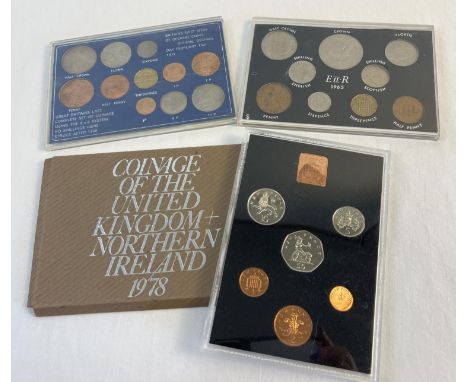 3 cased sets of Elizabeth II vintage collectors coins. A 1967 First Issue Of Decimal Coins, 1965 set including Churchill crow