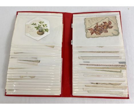 An album containing 40 assorted Edwardian &amp; vintage greetings cards. 