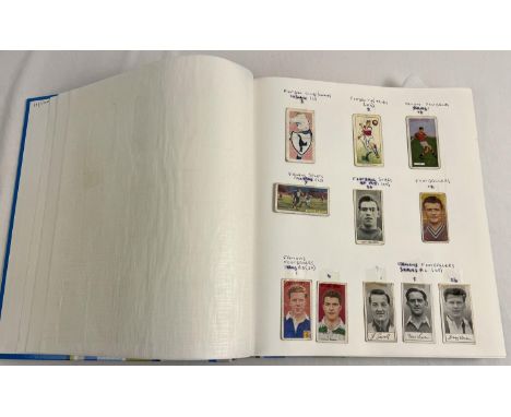 An album containing a collection of various vintage cigarette and bubble gum collectors cards of footballers and football tea