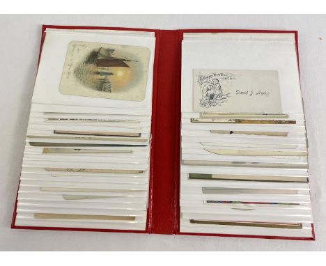 An album containing 40 assorted Edwardian &amp; vintage greetings cards. 