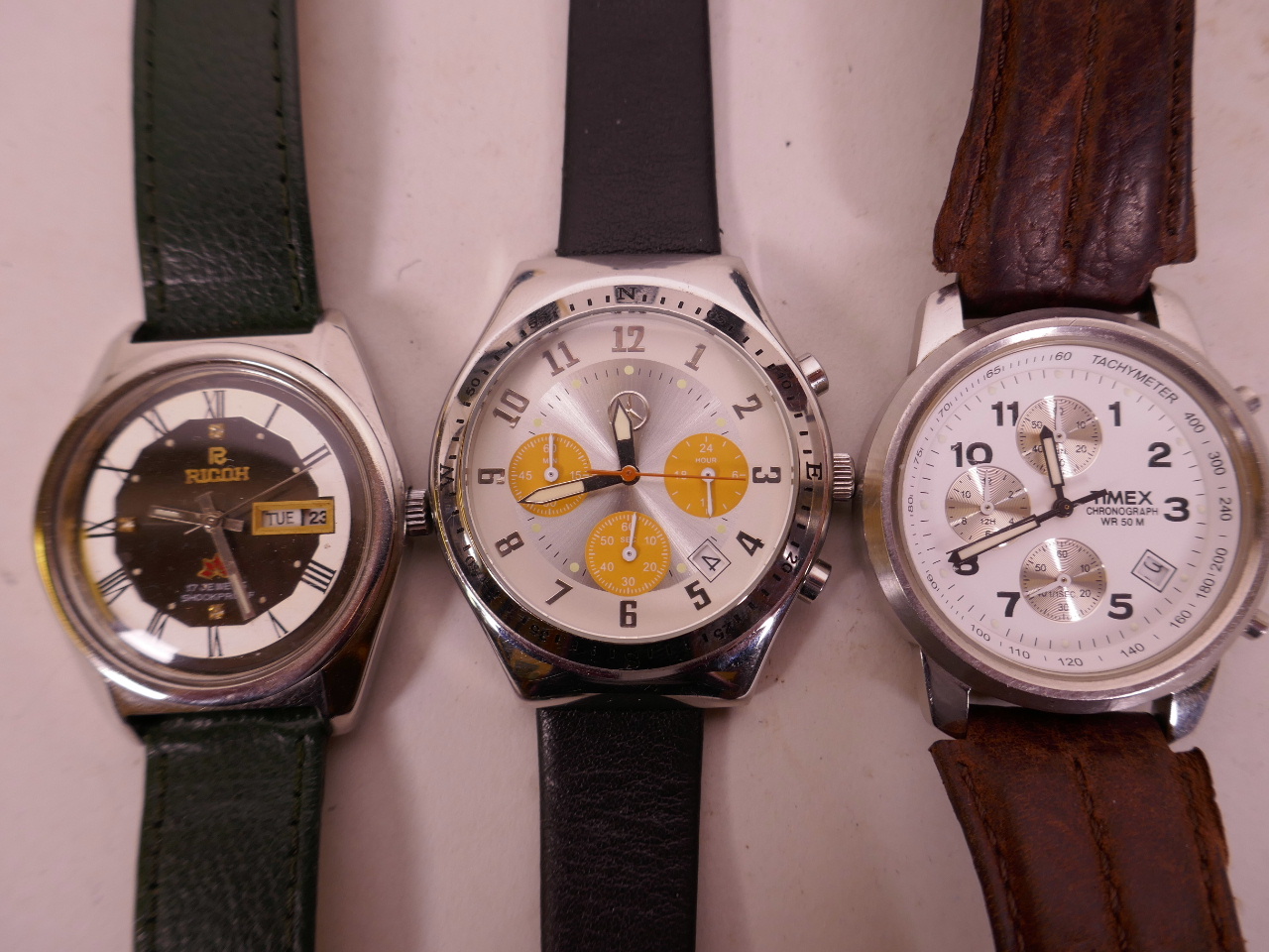 A Mercedes Benz chronograph wristwatch together with a Timex ...