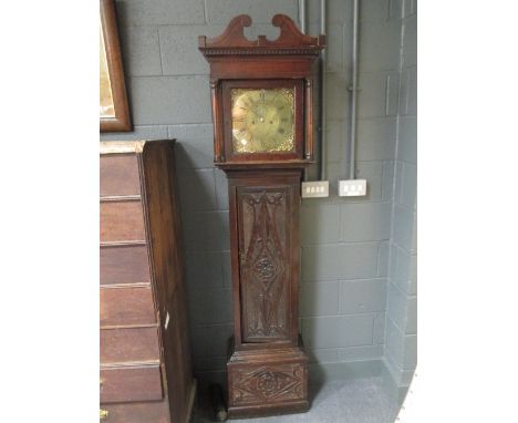 William Collier, Newport, a carved oak longcase clock with 8 day movement, brass dial with calendar, subsidiary dial, later c