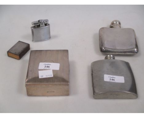 A sterling matchbox sleeve, a silver hip flask, another in pewter, a silver cigarette box etc  