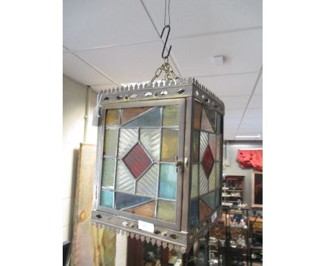 A Victorian brass and stained glass hall lantern in the gothic manner  
