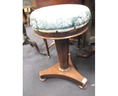 A Victorian rosewood piano stool  
