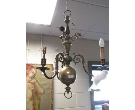 A Dutch style brass ceiling light  