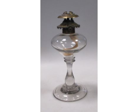 A glass oil lamp  