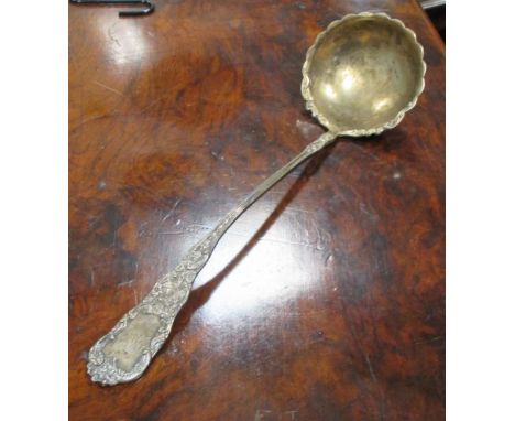 A sterling silver ladle by Birks  