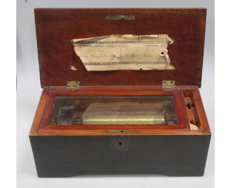 A Swiss music box playing four airs  