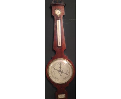 A Victorian mahogany wheel barometer, with silvered 10inch dial, signed to a level below 'A Guanella, Bristol', 108cm (42in) 