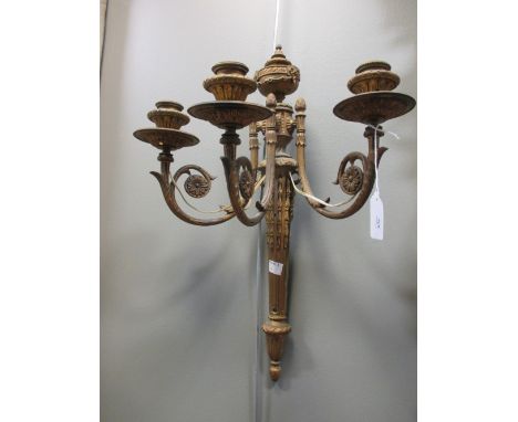 A pair of neo classical gilt brass wall light brackets  