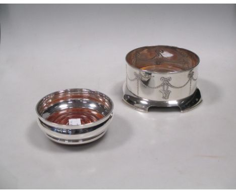 An Edwardian silver wine coaster by William Hutton & Sons, Birmingham 1907, 14cm wide and another smaller coaster by A T Cann