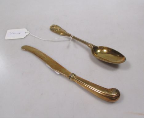 A white metal pepper together with a cased gilt knife and fork  