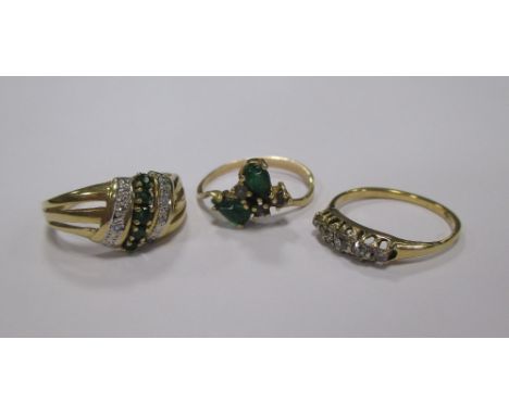An 18ct green and white hardstone ring, size M, a green hardstone ring stamped 585, size L-M and an 18ct five stone diamond r