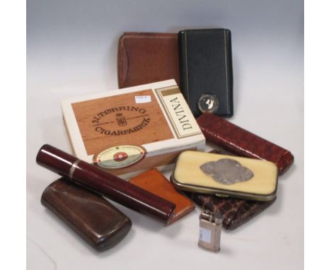 A collection of cigar cases, cigars, cigar cutter and lighter  Brand of cigars, N TORRING CIGAR FABRIK - DIVINA. The box is u