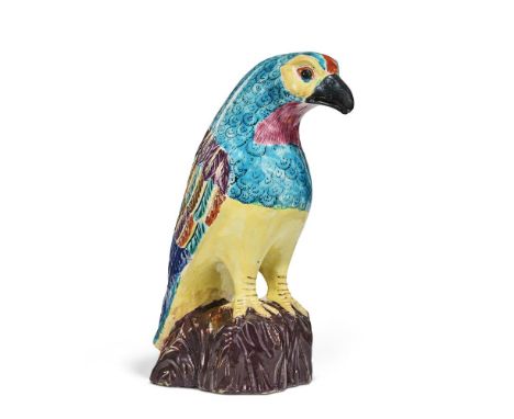 ‡ &nbspA STAFFORDSHIRE POLYCHROME SALT-GLAZED STONEWARE MODEL OF A HAWK   CIRCA 1755  Modelled standing on a manganese rockwo
