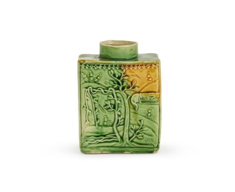 ‡ &nbspA STAFFORDSHIRE CREAMWARE TEA CADDY  CIRCA 1755  Splashed in green and yellow glazes and moulded with a tea bush label
