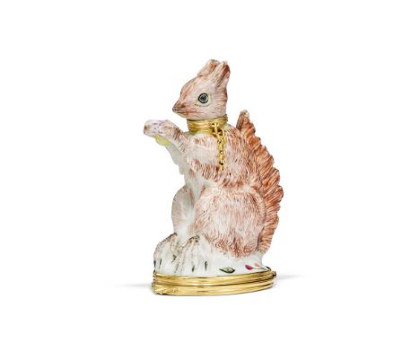 ‡&nbspA GOLD-MOUNTED 'GIRL IN THE SWING' PORCELAIN SCENT-BOTTLE MODELLED AS A SQUIRREL  CIRCA 1755, CHARLES GOUYN'S FACTORY, 