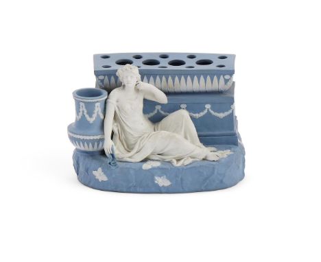 ‡&nbspA WEDGWOOD BLUE JASPER FIGURAL BOUGH-POT  LATE 18TH CENTURY  Sprigged in white and modelled with Psyche seated before a