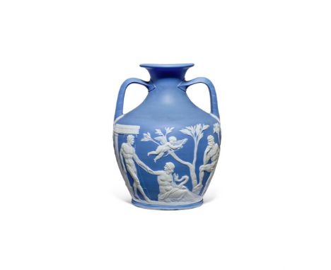 ‡ &nbspA WEDGWOOD BLUE JASPER MODEL OF THE PORTLAND VASE  CIRCA 1791  The twin-handled blue urn sprigged in white relief with