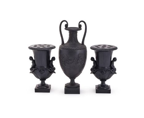 ‡ &nbspAN ASSEMBLED GARNITURE OF THREE WEDGWOOD & BENTLEY BLACK BASALT VASES  VARIOUS DATES LATE 18TH CENTURY Comprising a pa
