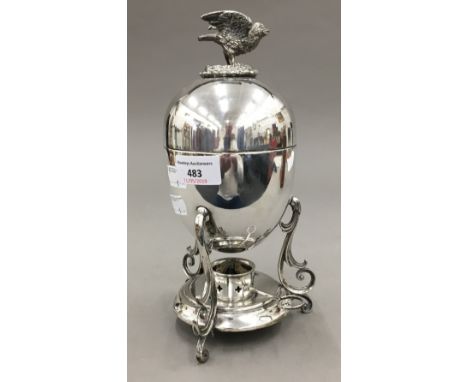 A silver plated egg coddler and cover, with bird and bird's nest finial