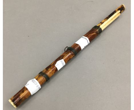 A Chinese tortoiseshell and bone chopstick and knife set
