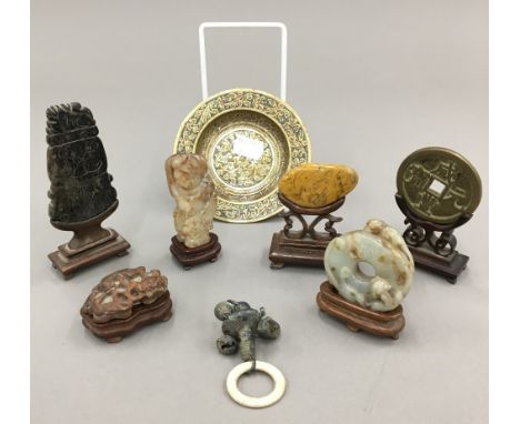 A small quantity of Chinese carved jade and other hardstone, with stands, together with a small quantity of metalware
