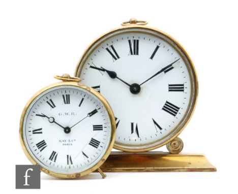 A GWR brass barrel clock by Kay & Co Paris and a 3 1/2 inch main clock for R Lanbryn Railway No. 5708, A/F. (2)With related p