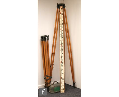 A Troughton &amp; Simms grey painted surveyors level S038397, cased, also two Hilger and Watts tripods and an adjustable rule