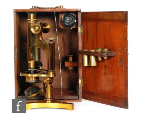A late 20th Century brass microscope by R &amp; J Beck London and Philadelphia No. 10737 on tricorn base with accessories in 