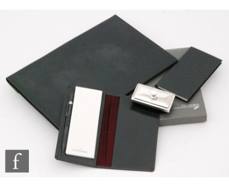 A collection of Concorde memorabilia, circa early 1990s, to include a boxed ink blotter, a leather stationery wallet, a noteb