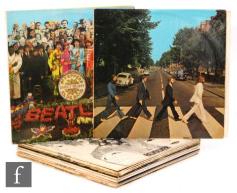 The Beatles,  a collection of vinyl records to include two 'Revolver' Parlophone PCS 7009 1969 repressing, 'Help' Parlophone 