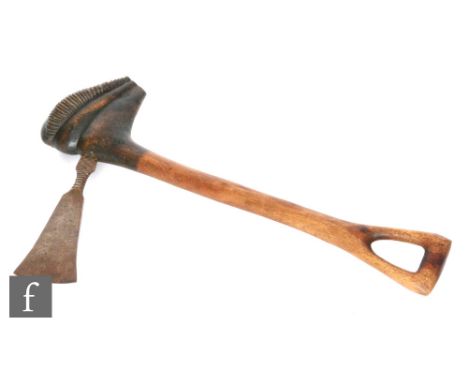 A tribal carved hand axe, possibly North African, length 48.5cm