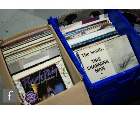 A collection of 12" albums, various artists and genres, to include Prince, The Beatles, Style Council, UB40, Human League, Th