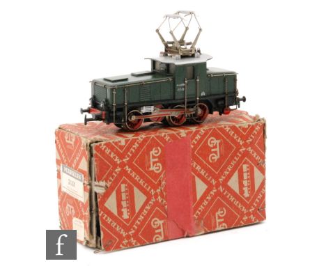 A Marklin #3001 HO gauge 3 rail overhead electric Class E63 0-6-0 locomotive with green livery and off centre cab 'E63 02', b