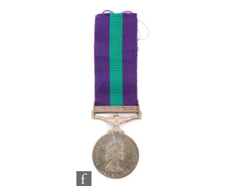 A Queen Elizabeth II General Service medal with Malaya bar, awarded to 23276940 Sig. J.W. Spencer, R. Sigs, retains ribbon, i